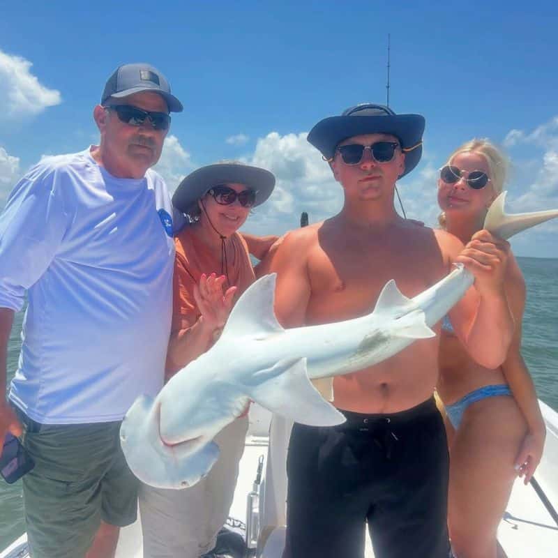 Kids shark fishing with family on Beaufort SC fishing charter