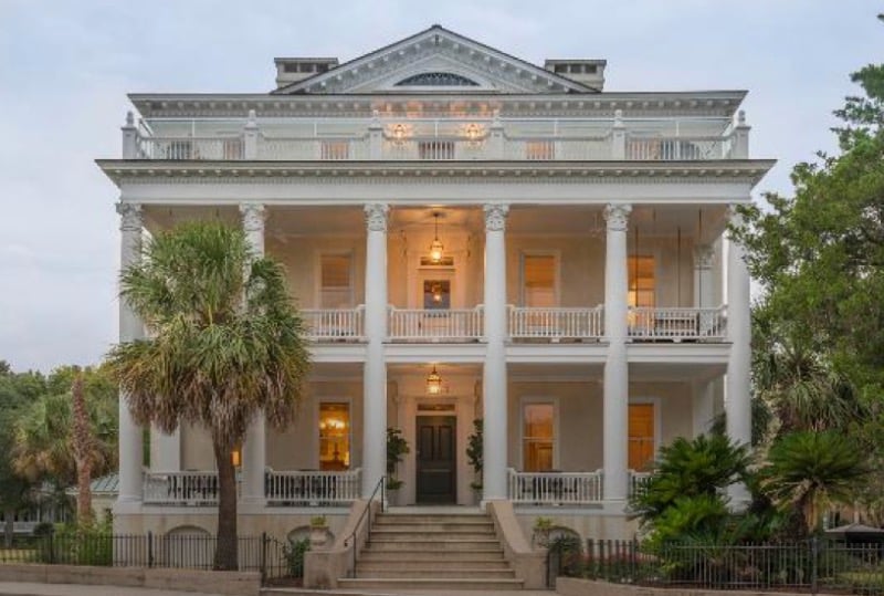 A historic antebellum home with two porches and white pillars in Beaufort SC