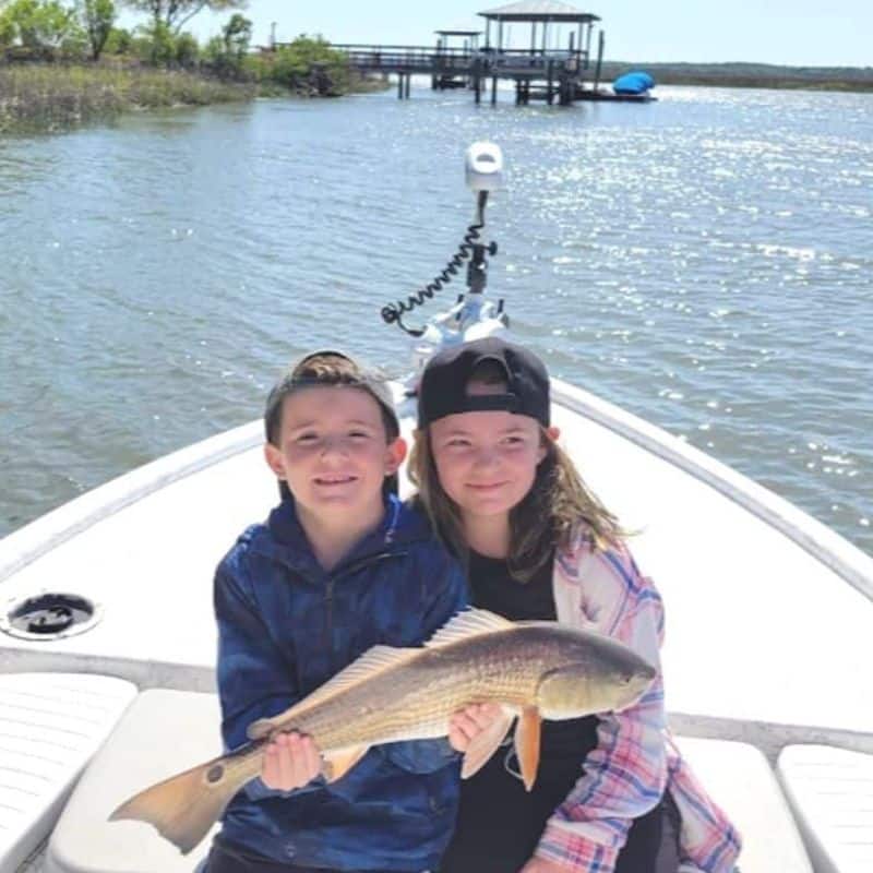 Family smiling on Beaufort SC fishing charter boat