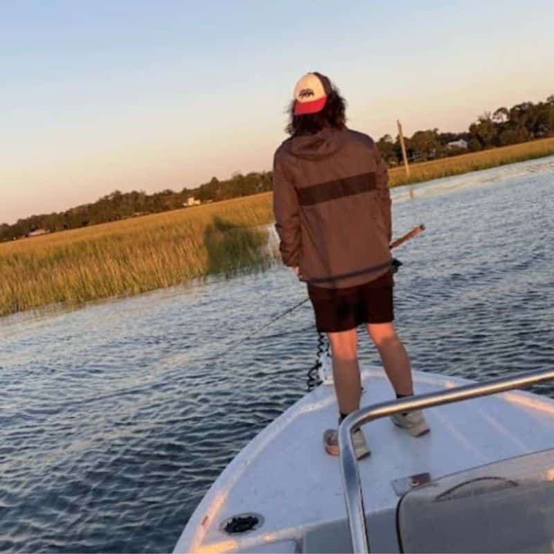 Angler standing on boat in Beaufort SC fishing charter