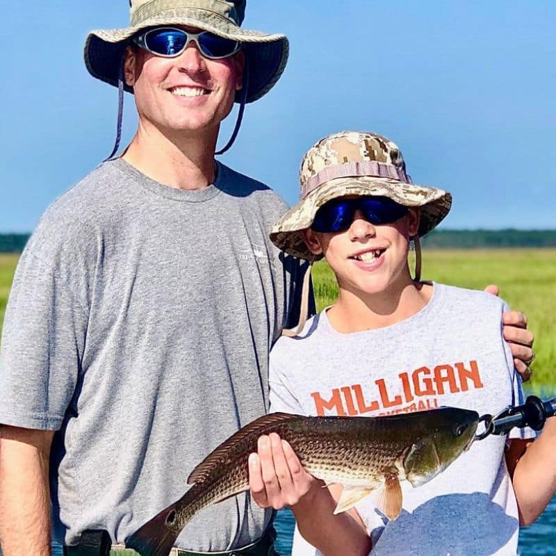 Family fishing together on Sea Islands boat charter
